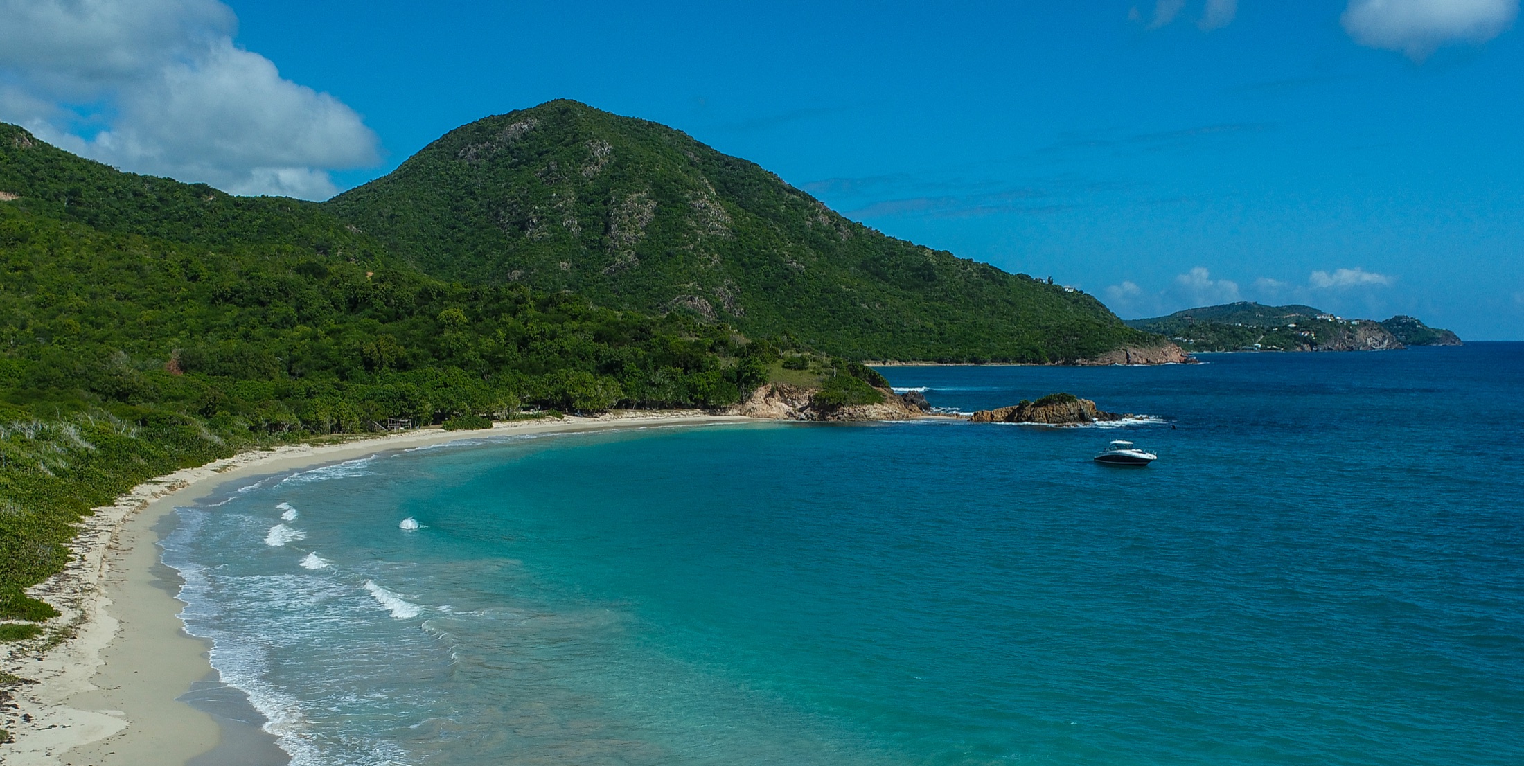 TITO 2 anchored in clear Caribbean water